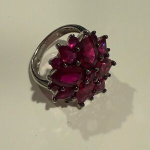 7.22CTW PEAR SHAPE AND ROUND LAB CREATED RUBY RHODIUM OVER STERLING SILVER RING